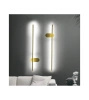Nowoczesny złoty kinkiet IKO 90cm LED podświetlający ścianę