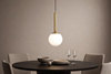 Pojedyńcza lampa wisząca z białym, kulistym kloszem TOKI Kaja Lighting K-5860