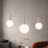 Lampa wisząca beżowa trzy białe klosze o różnych wielkościach na belce TESTA 3xG9 Candellux Studio 33-51110