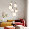 Lampa wisząca beżowa 6 szklanych kloszy o różnych rozmiarach na okrągłej podstawie TESTA 6xG9 klosze białe Candellux Studio 36-50915