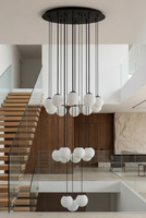 Czarna lampa wisząca z kloszami do wysokich pomieszczeń Kaja Lighting KP-34