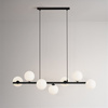 Czarna lampa wisząca z kloszami-kulkami do salonu FILO Kaja Lighting K-5852