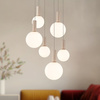 Lampa wisząca beżowa 6 szklanych kloszy o różnych rozmiarach na okrągłej podstawie TESTA 6xG9 klosze białe Candellux Studio 36-50915