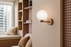 Beżowy kinkiet z białym kloszem do sypialni ARDI Kaja Lighting K-5844