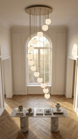 Beżowa lampa wisząca z białymi kulami na 13 żarówek Kaja Lighting KP-35